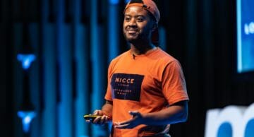 Andy Ayim speaking at Mind the Product London 2019