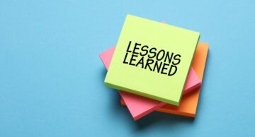 Lessons learned written on a post it